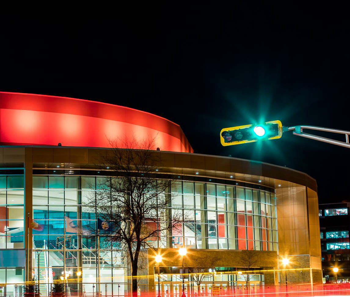 Evening photo of arena with bright lights