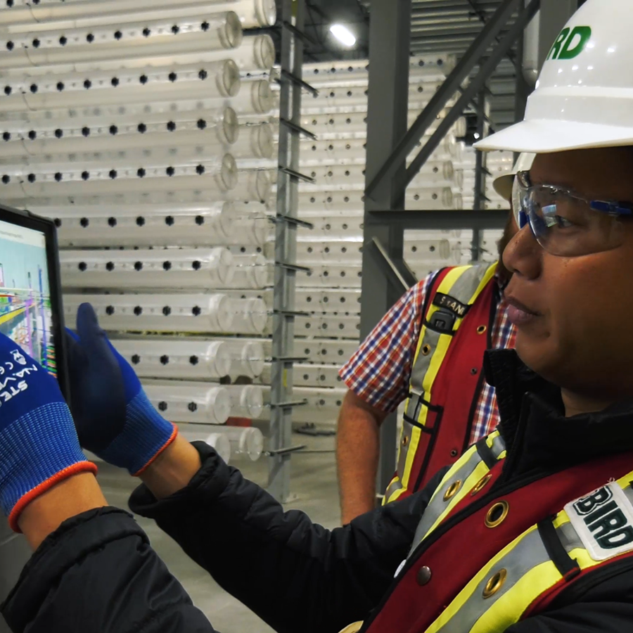 employee looking at a virtual building model