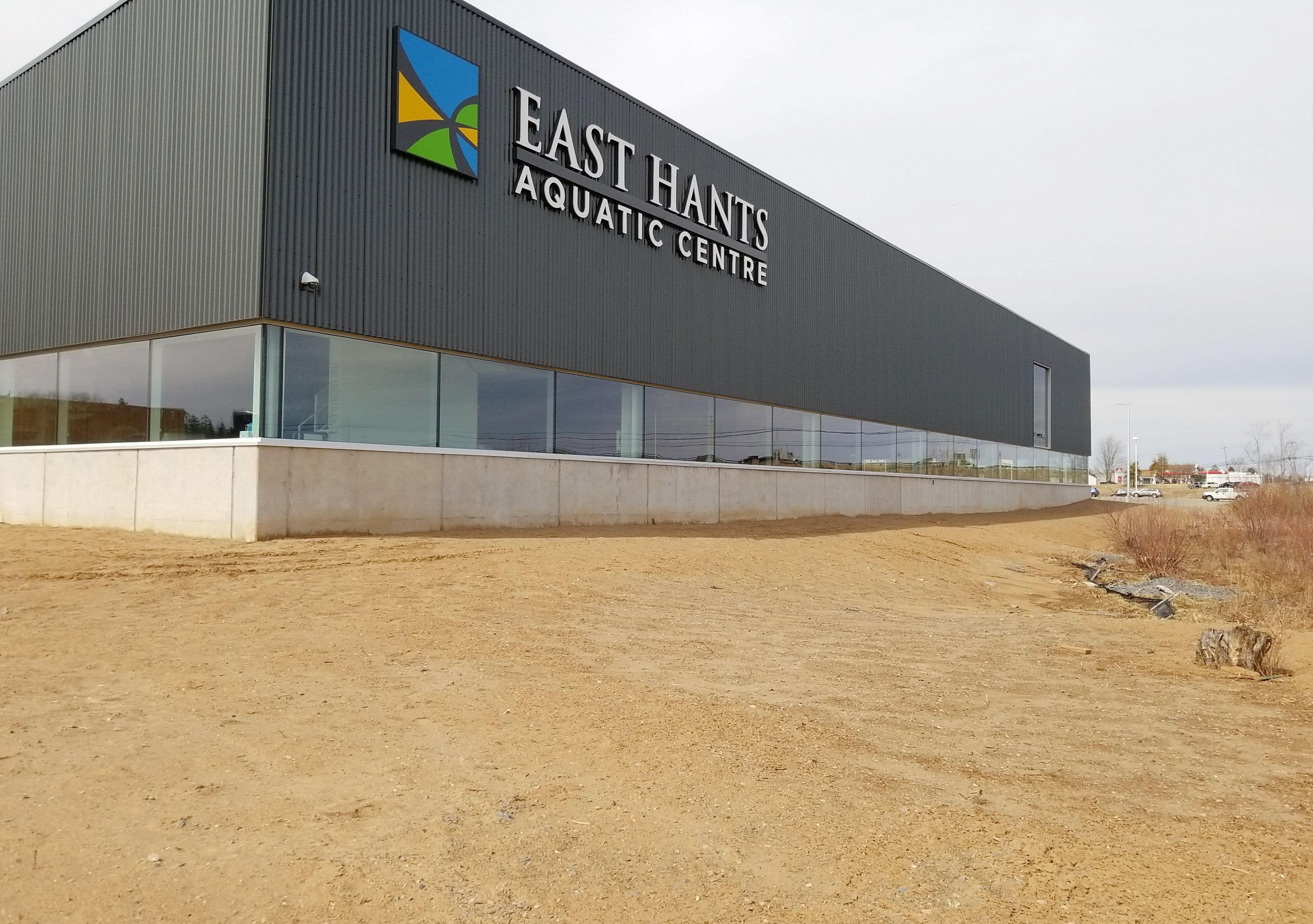 Exterior of East Hants Aquatic Centre showing signage on building