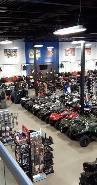 Interior of the ProCycle shop showing merchandise such as ATVs