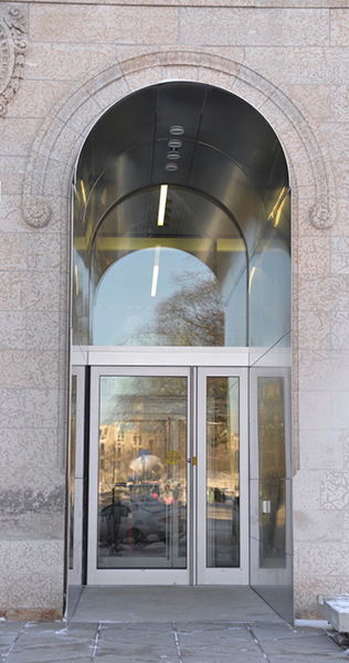 Entrance arch to Tache Hall showing stone detail