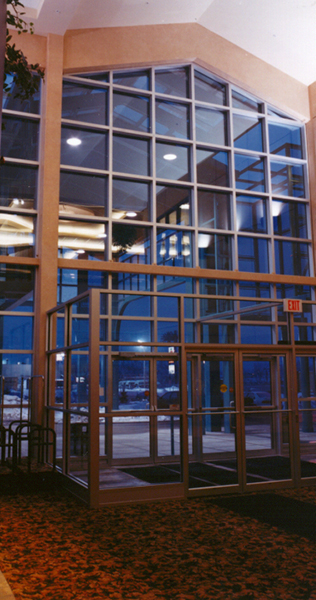 Interior Windowed Front Entrance Looking Out to Courtyard