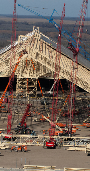 Construction Progress of Structural Steel Erection and Many Mobile Cranes and Man-Lifts
