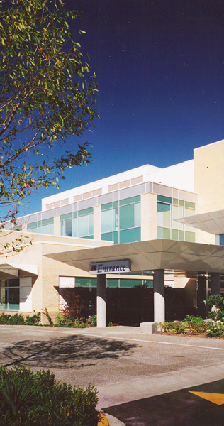 Front Curbside Covered Entrance with Signage