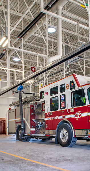 Interior of fire station showing parked fire engine