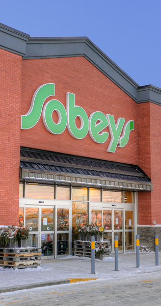 Front entrance of Sobeys Sage Creek showing building signage