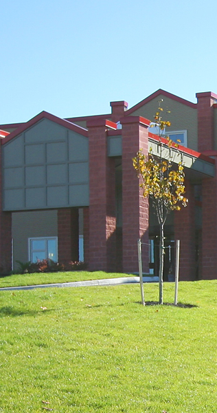 Landscaping with Building Facade of Brick and Glazing