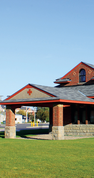 Former Porte-Cochere with Masonry and Brick Columns and Gabled Roof