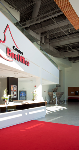 Box Office Counter with Red Carpet and Signage