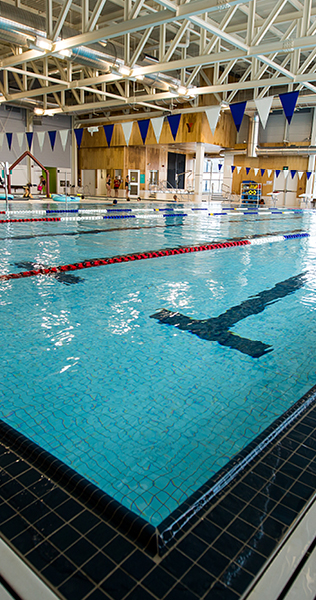 Interior of Pictou County Wellness Centre showing swimming pool and bunting