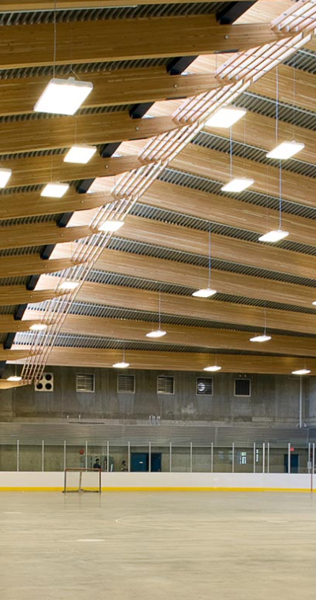 Interior of Trout Lake Arena showing rink and roof detail