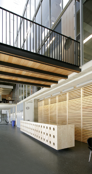 Interior reception area of the Wapisiw Lookout showing wood details