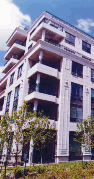 Exterior view of Thornwood Residential Condominiums  showing corner balconies