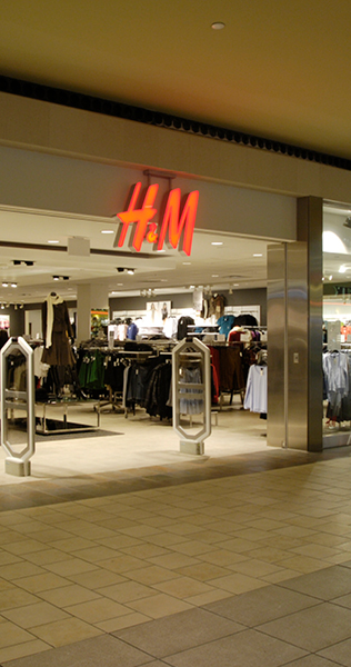 View of H & M entrance at Limeridge Mall showing signage