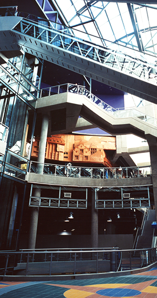 Interior view of the  Europa International Village showing escalators and stairs, and details of the roof