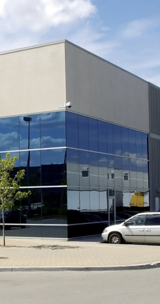 Exterior corner of building showing glazed window facade 