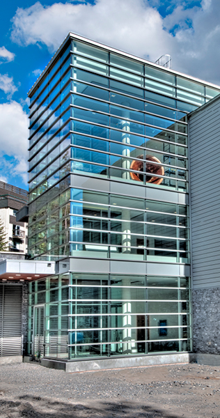 Exterior detail of the Kinnear Centre showing three-storey glass enclosed entrance
