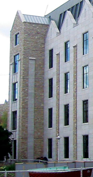 Close up view of exterior of University of Saskatchewan Spinks Addition showing brick and stone cladding