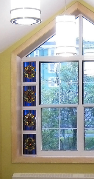 Interior details of window showing stained glass panel inserts
