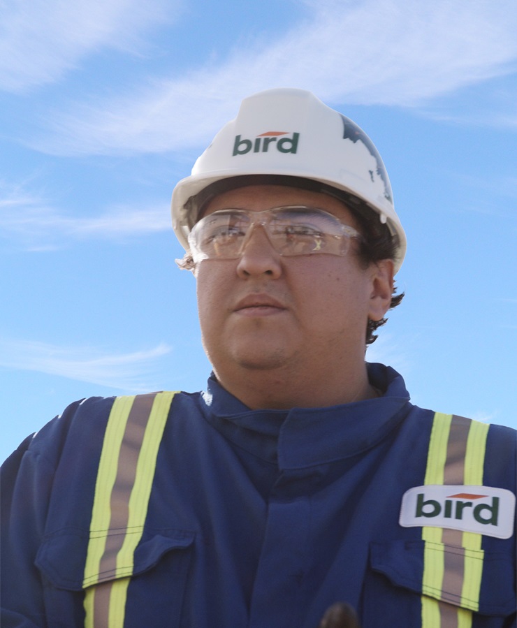 Indigenous Person with Bird Construction gear on