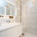 Interior of Stack modular unit showing bathroom vanity and shower