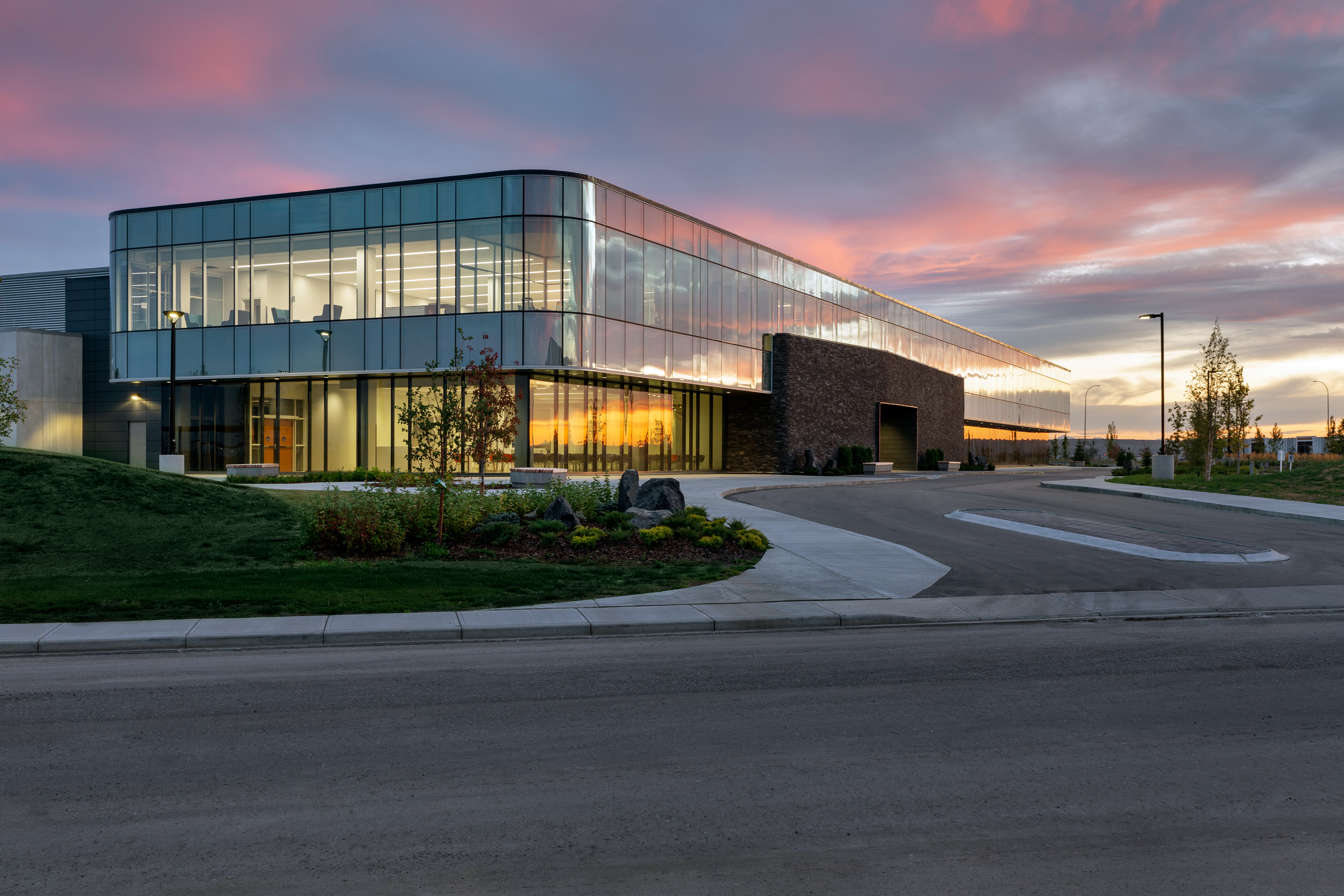 Exterior of the Canadian Blood Services Production Facility at sunset