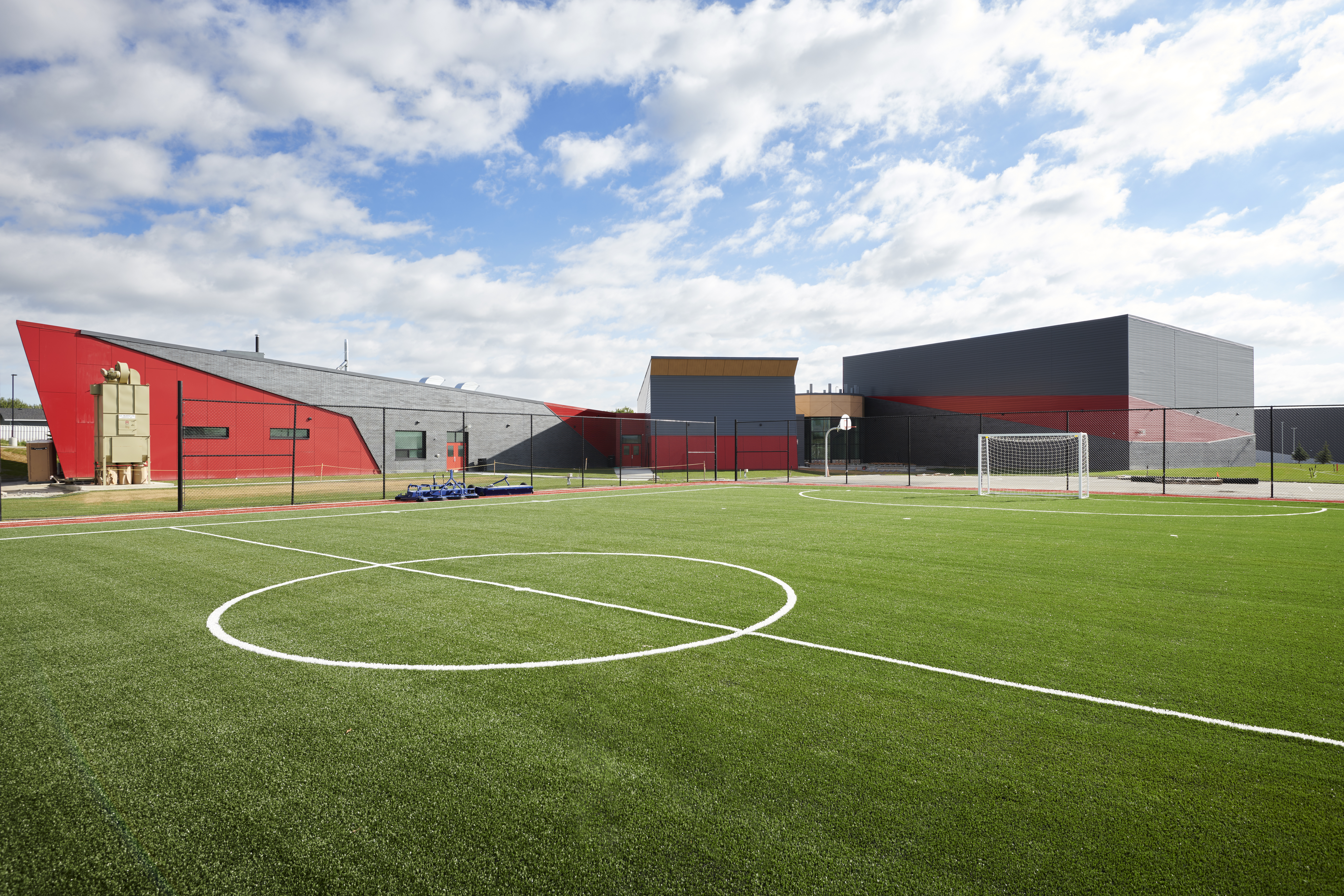 Exterior of the TsuuT'ina High School showing sports fields
