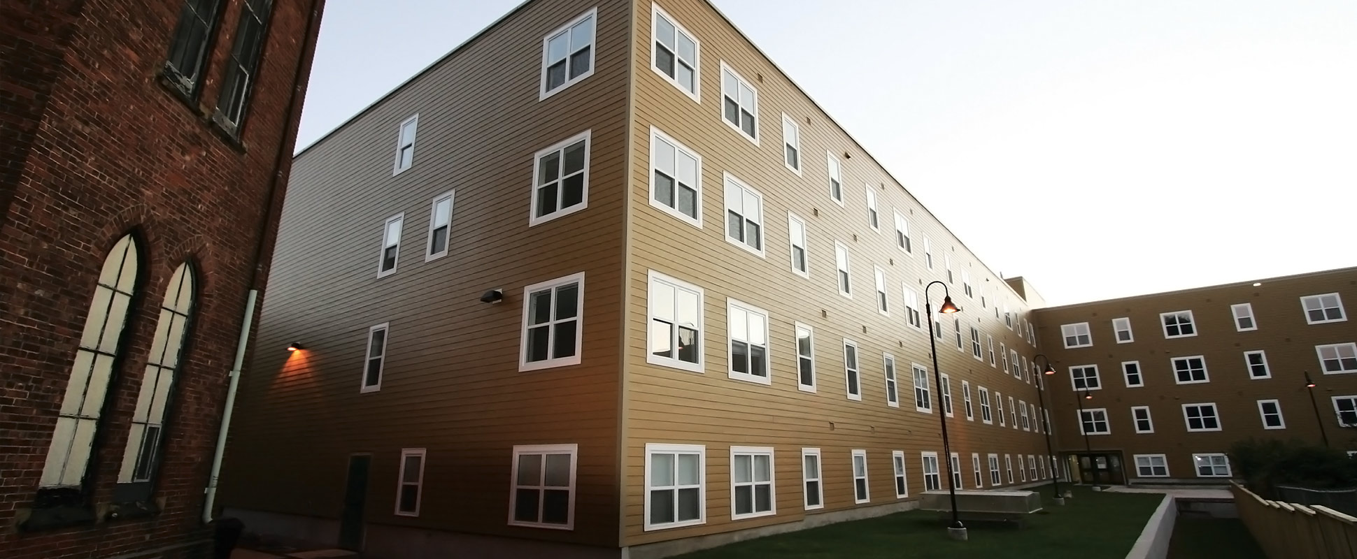 Angled exterior view of the Abbey St. Andrew Apartments