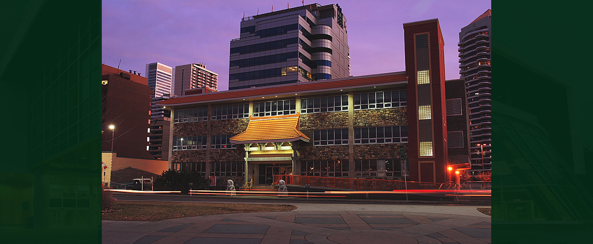 Exterior of Avatamsaka Monastery entrance lit up at night