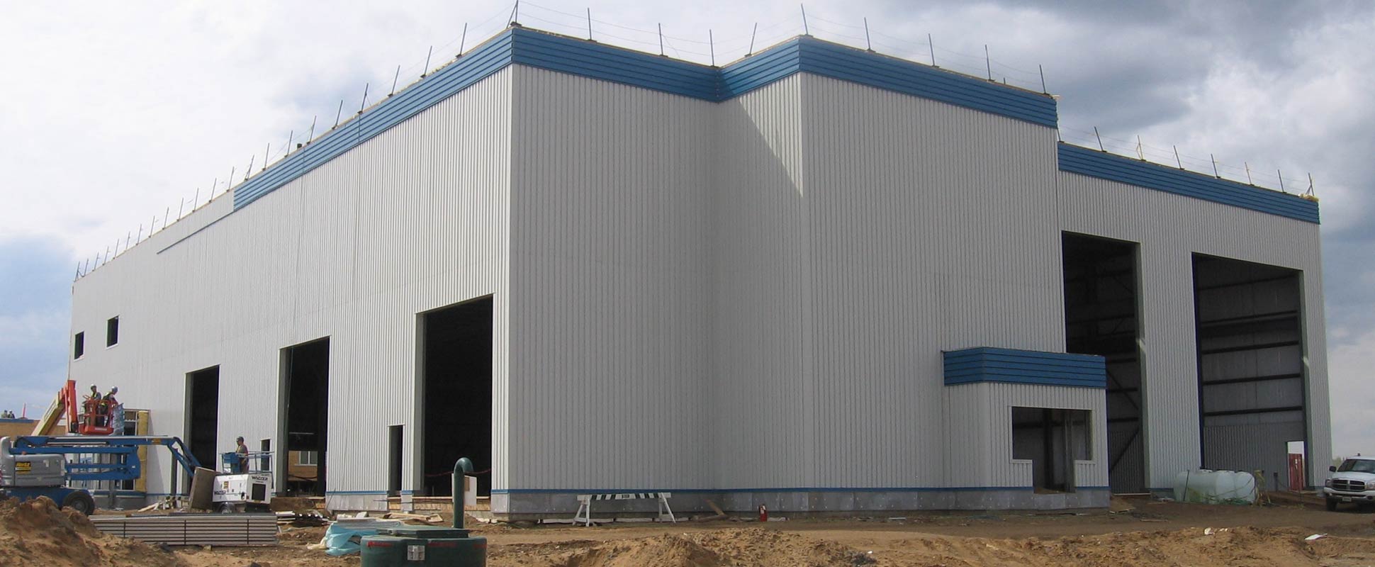 Plant Shop and Bitumen Maintenance Building exterior showing bay doors
