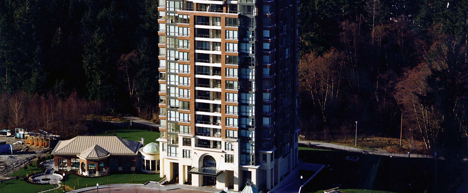 Claridges Condominiums exterior showing large entrance arch 