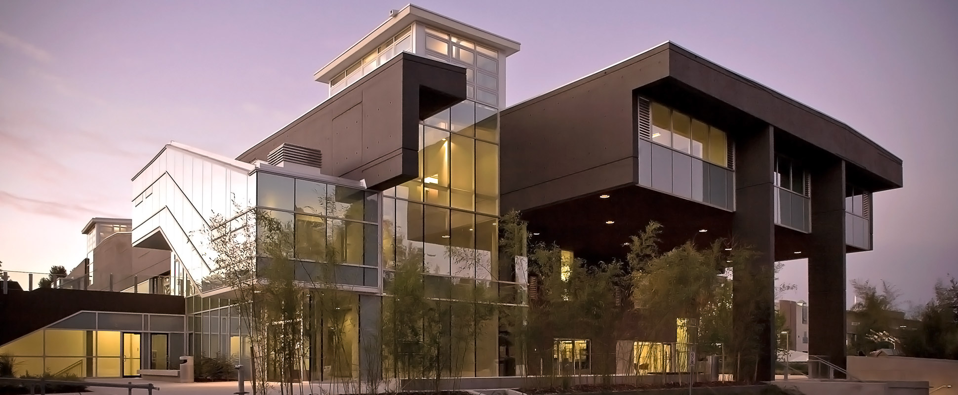 Langara College Library and Classroom Building exterior with greenery in foreground