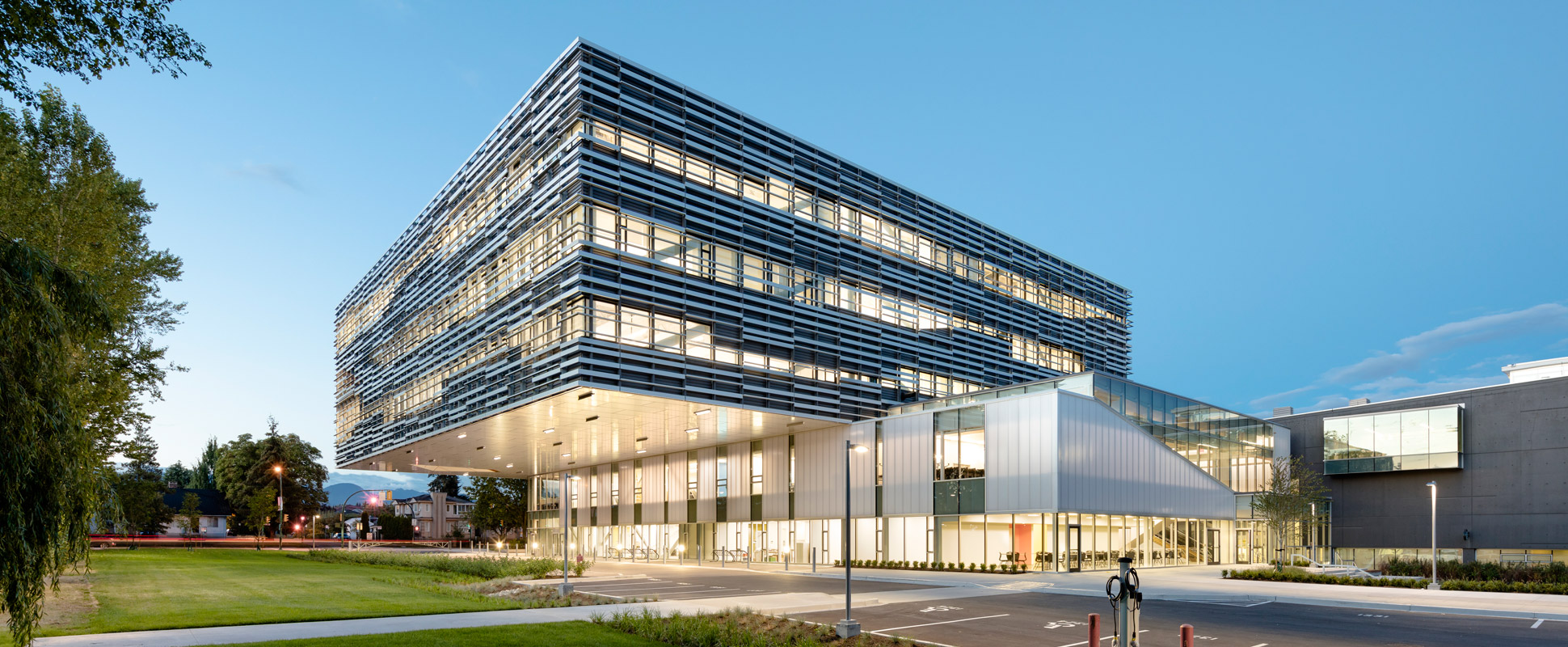 Langara College Science and Technology Building exterior lit at dusk