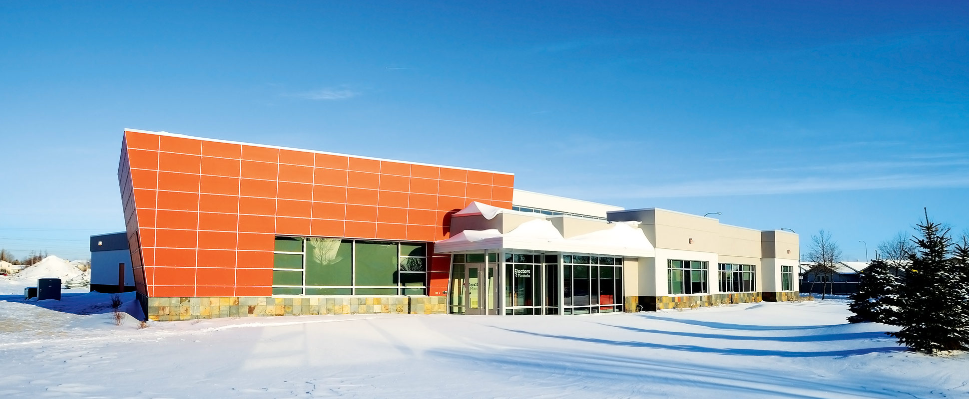 Manitoba Medical Association Building exterior showing orange accent wall