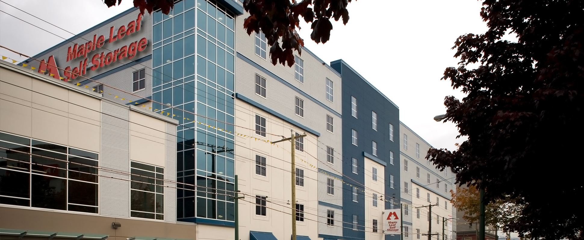 Maple Leaf Self Storage Facility exterior showing building signage 