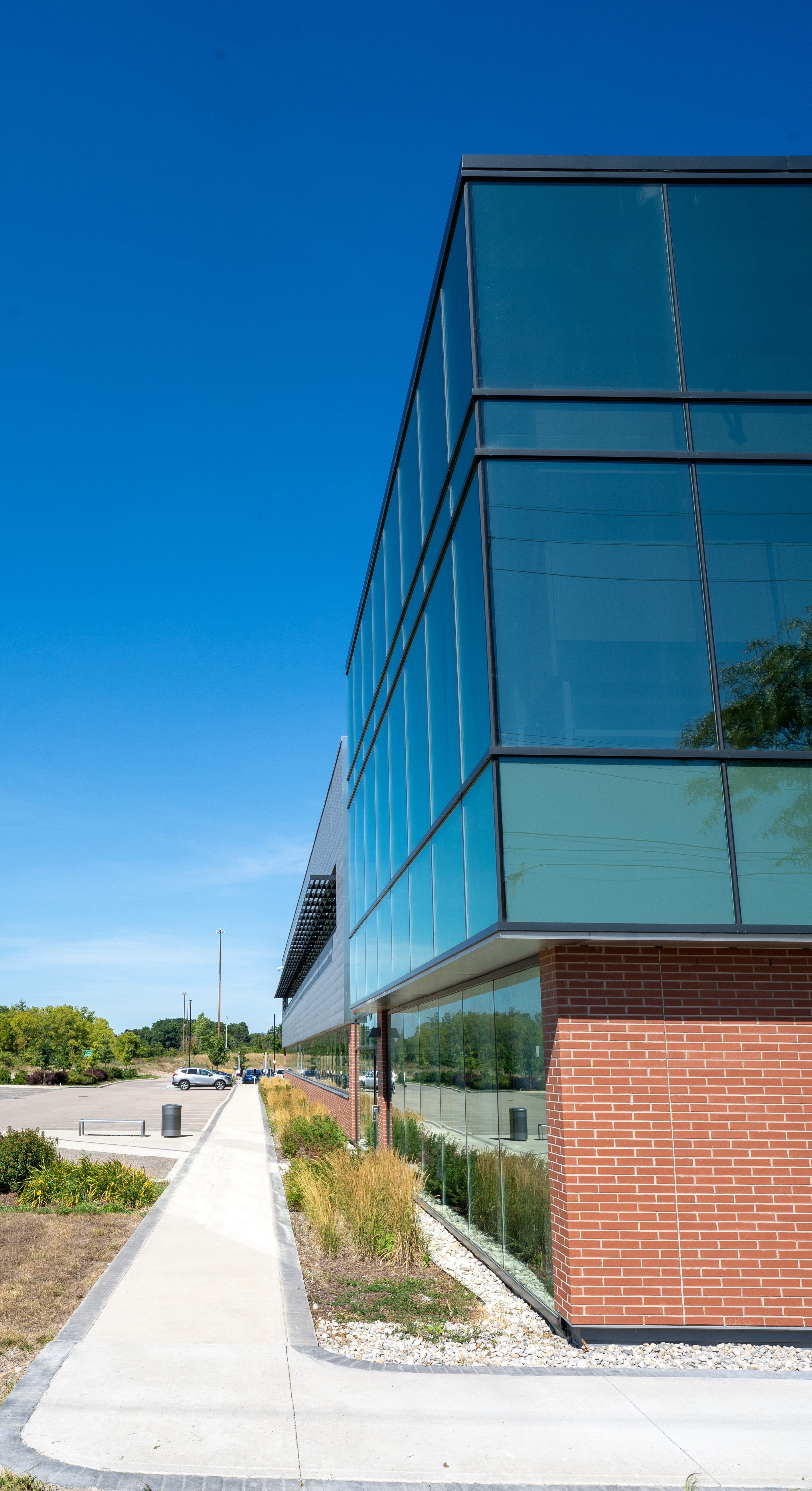 Exterior of building showing blue tinted glass facade