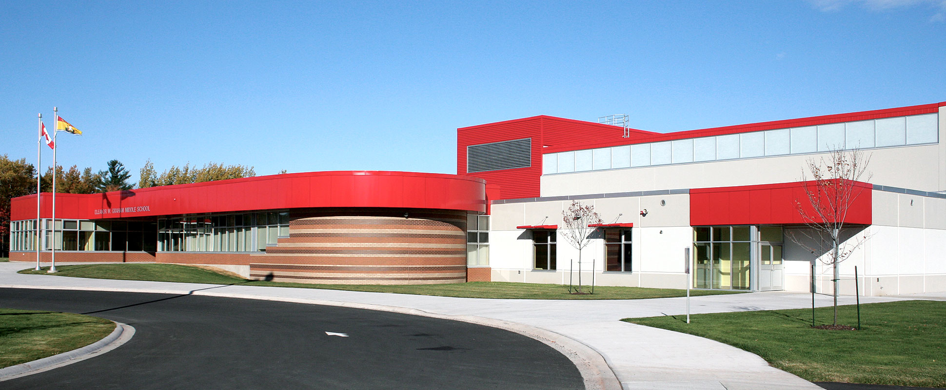 Exterior of school with red accents