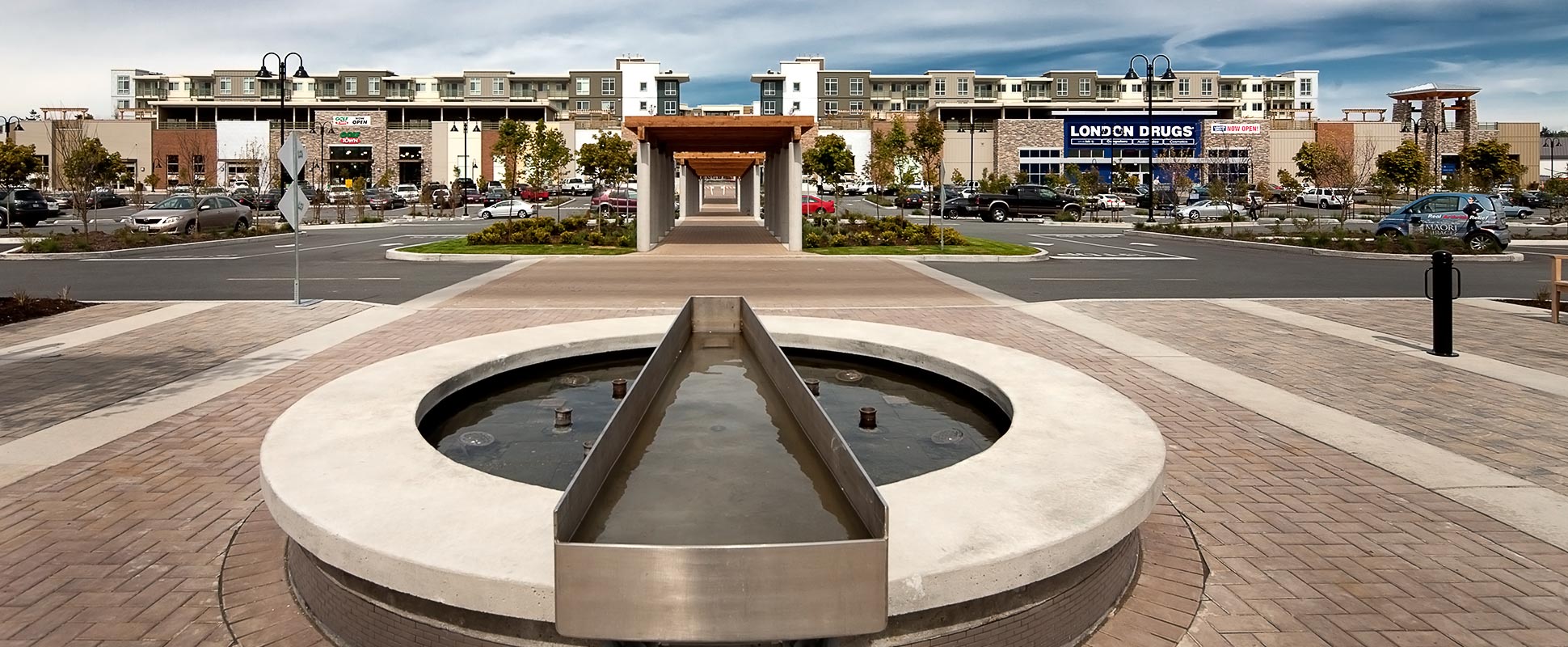 Morgan Crossing exterior with water feature in foreground