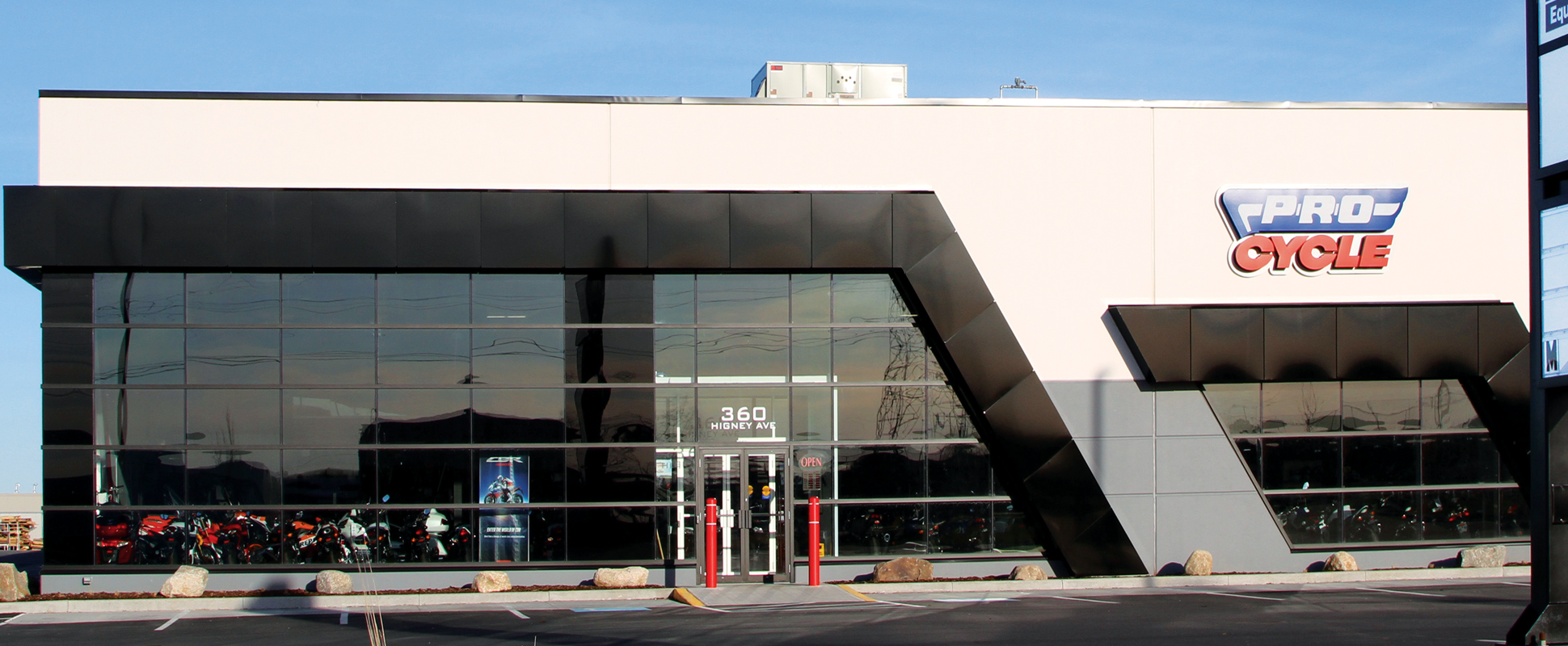 Pro Cycle store exterior showing large window wall and building signage