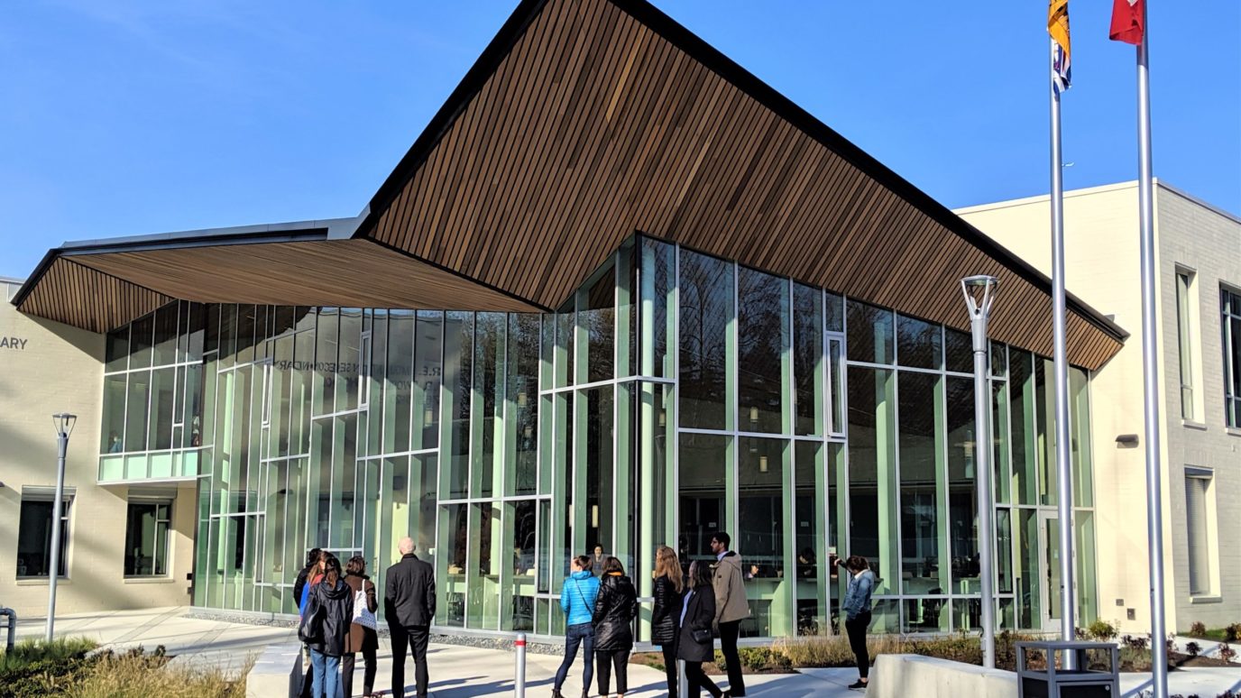 R.E. Mountain Secondary School exterior showing glass wall