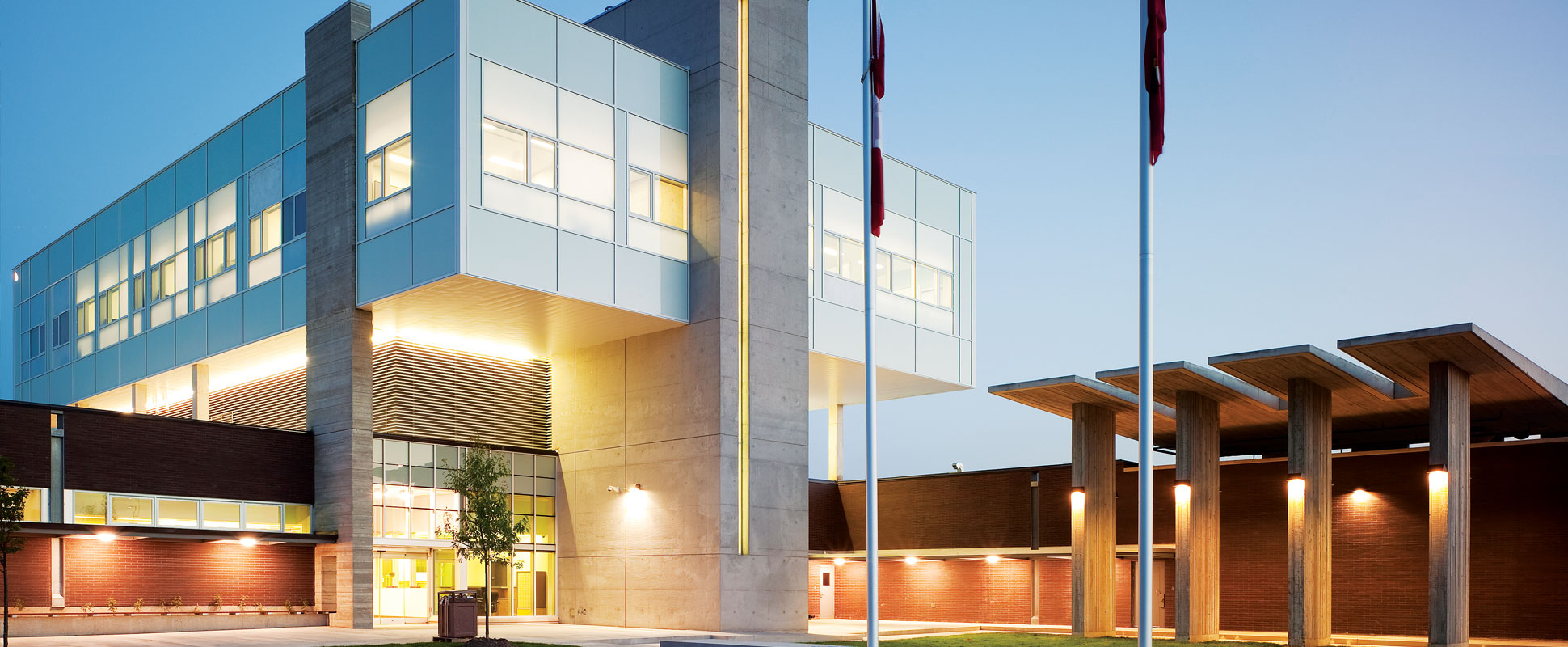 Roy McMurtry Youth Centre exterior lit at night 
