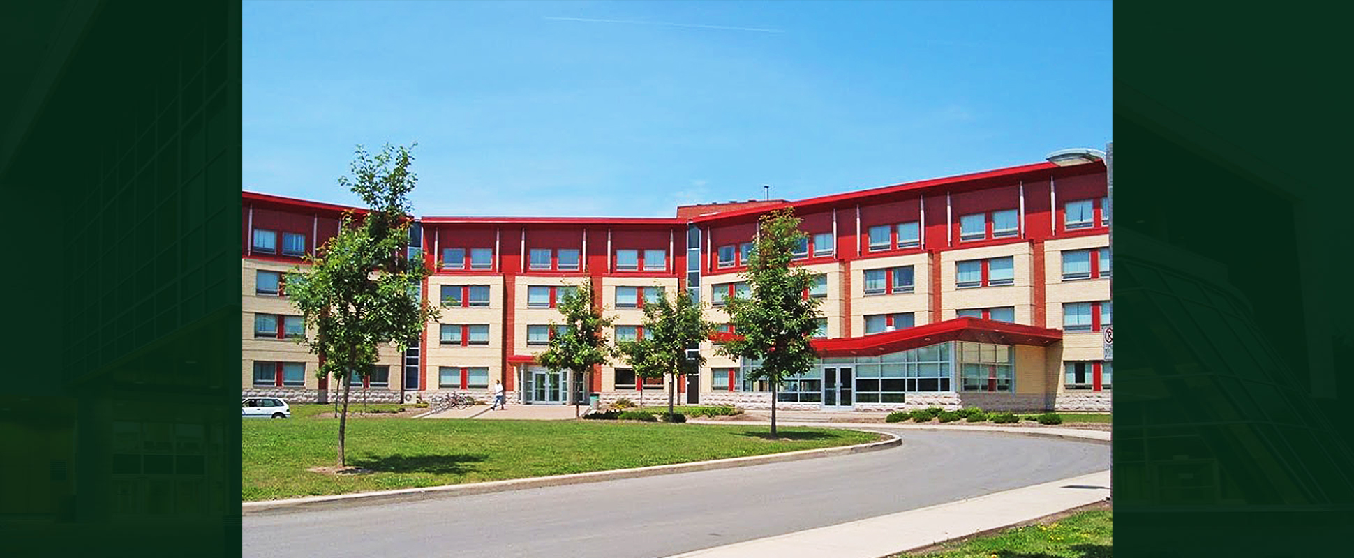 Sheridan College Student Residence exterior showing red accents