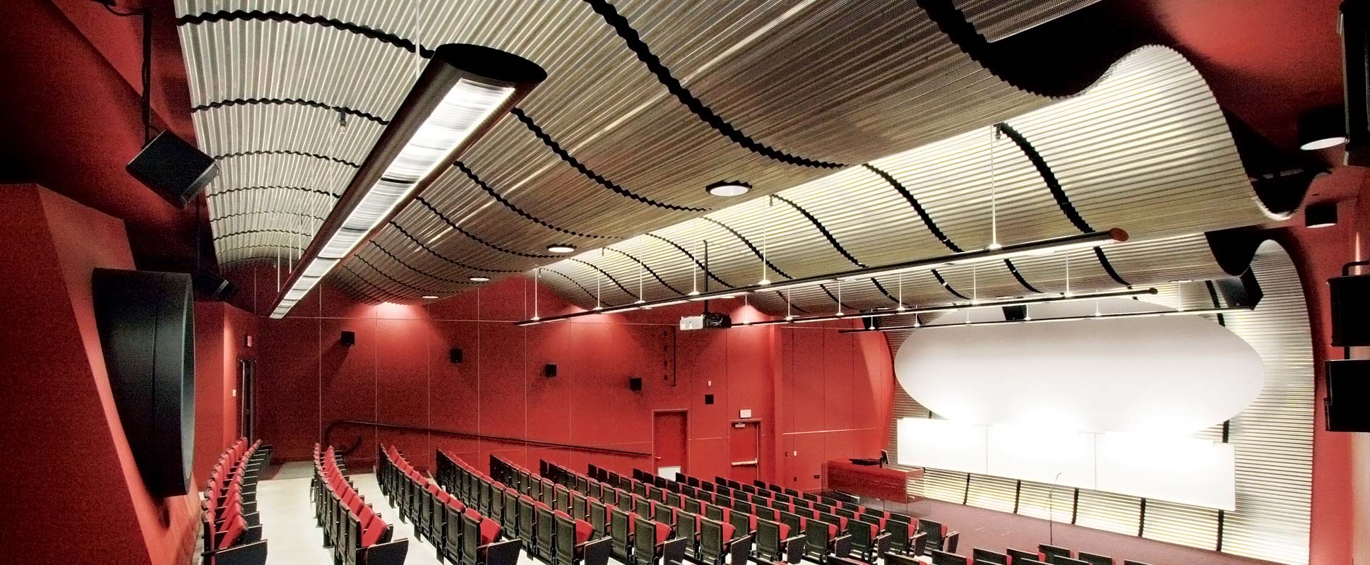Simon Fraser University Central City Lecture Theatre showing seating and red accents on walls