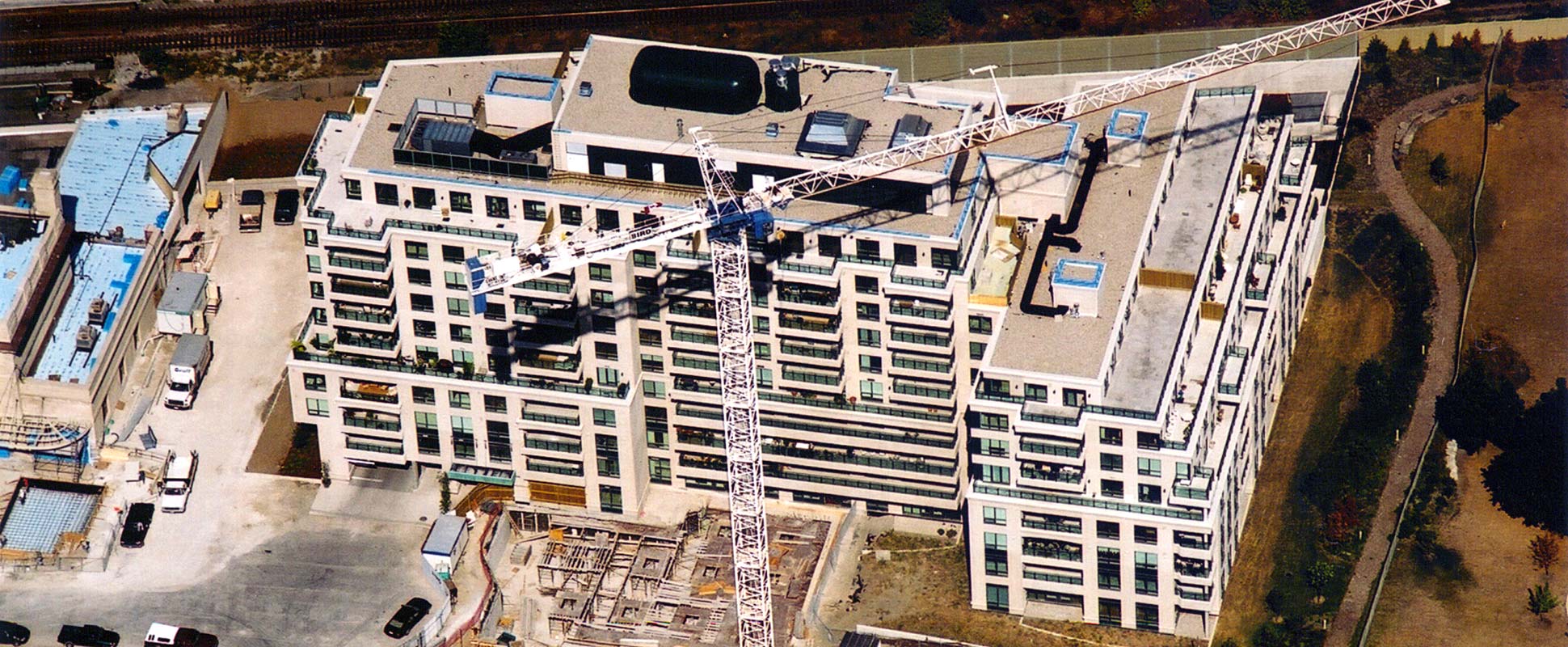 Aerial view of the Thornwood Residences Phase 1 with a crane in action