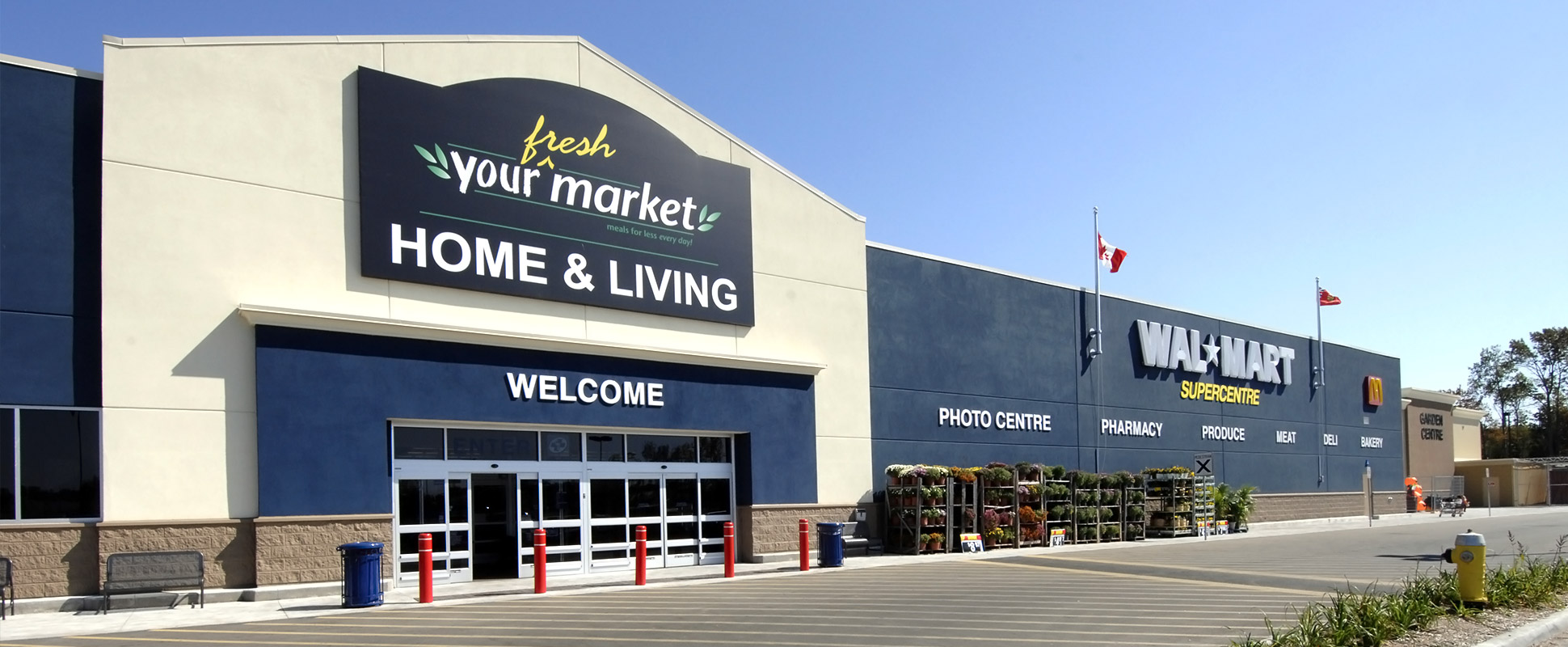 Close up of Walmart store exterior showing building signage above entrance