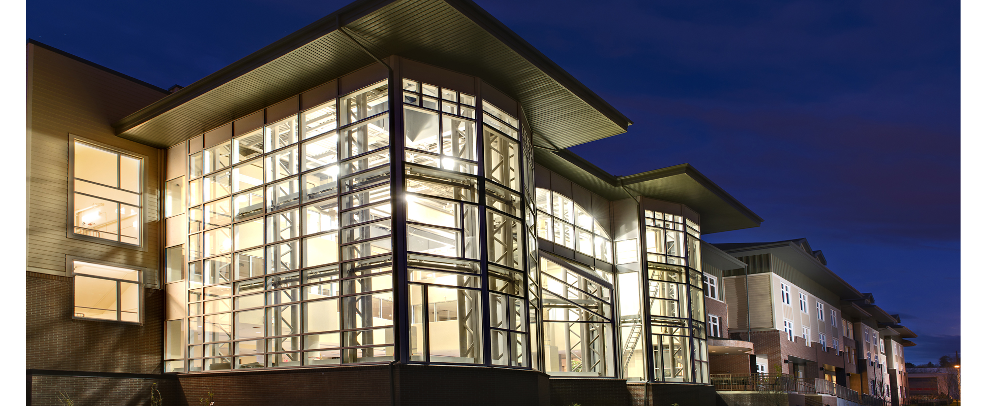 Wing Kei Greenview Senior Supportive Living Centre exterior lit up at night